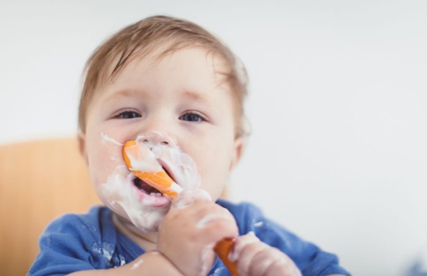 Baby eating formula