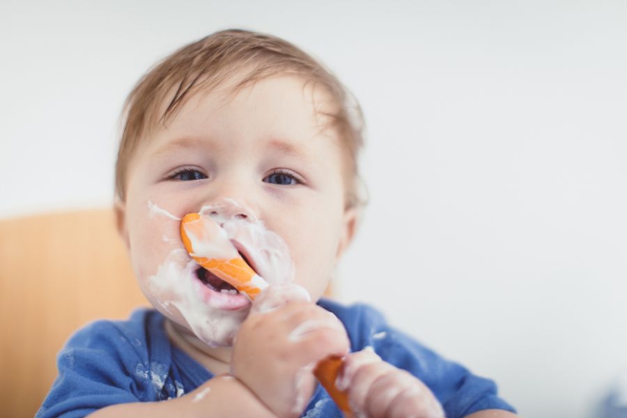 Baby eating formula