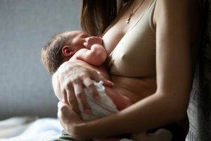 Mother breastfeeding a baby